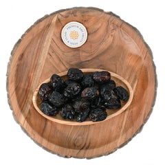 Buy Ajwa dates online they Organic and chewy and medium sweet delicious.