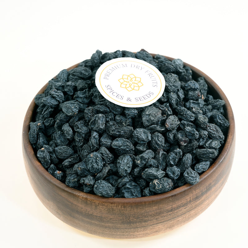 Our House of Rasda black raisins are seedless and sourced from the finest quality grapes. These black kismis are perfect for snacking or adding a touch of sweetness to your favorite recipes. • Imported from Afghanistan, these Raisins are naturally tart and delicious.