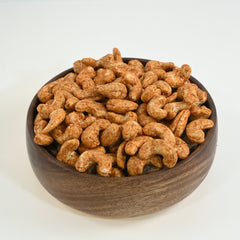 Cashew Nuts Barbeque features premium cashews seasoned with a blend of onion, garlic, tomato, black pepper, chili powder, and a hint of citrus.