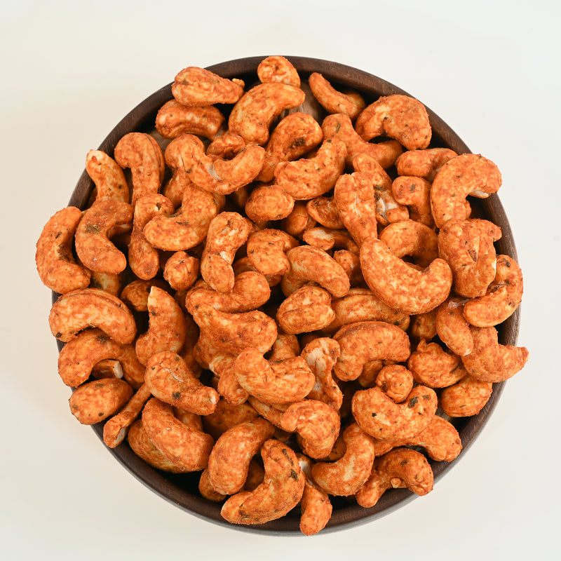 Cashew nuts Paneer Tikka spiced are roasted cashews that are generously coated with the savory and mildly spicy flavor of paneer tikka masala. 