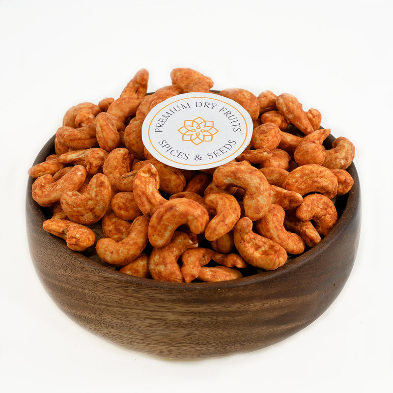 Experience the bold and spicy flavors of our Cashew Peri Peri. Made from all-natural ingredients, these cashews are coated in a fiery blend of herbs and spices for a delicious and nutritious snack. Elevate your taste buds with the unique and irresistible taste of Cashew Peri Peri.
