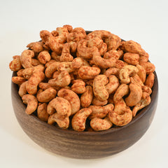 Cashew Nuts Red Chilli Spiced The seasoning is made from a blend of spices, including cumin, coriander, and red chilli powder, which gives the nuts a complex and well-rounded taste