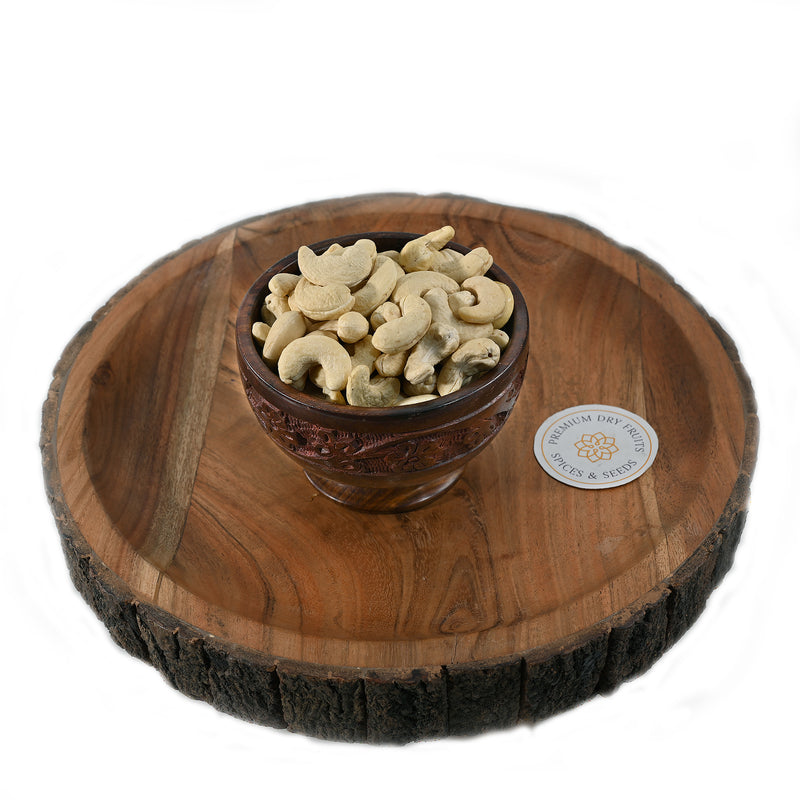 Cashew kernels are obtained through processing (roasting / steaming, shelling and peeling) of raw cashew nuts