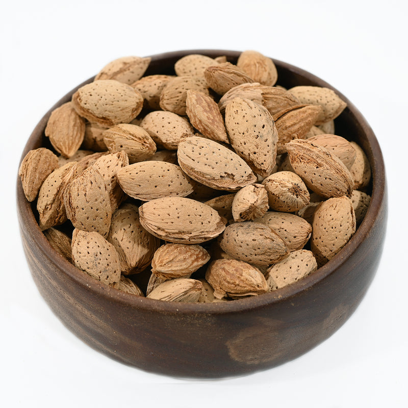 Almonds Inshell , also known as Kagzi almonds or Sabut Kagzi Badam, are almonds that have not been removed from their hard outer shells. 