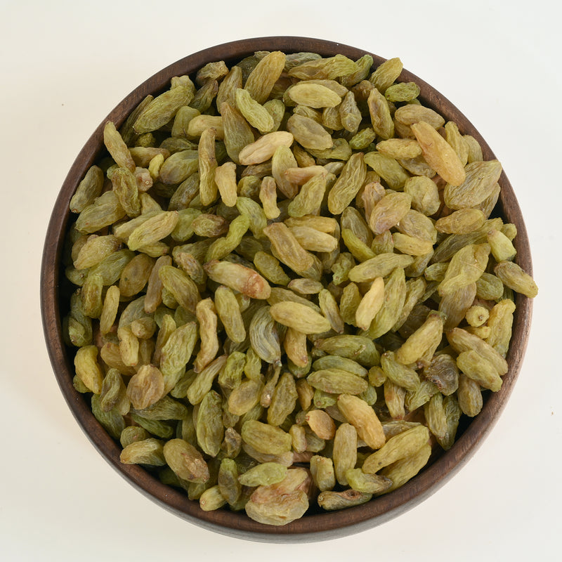 Kandhari Raisins have a distinctive dusty green hue and are often described as succulent and flavorful, making them a delicacy.