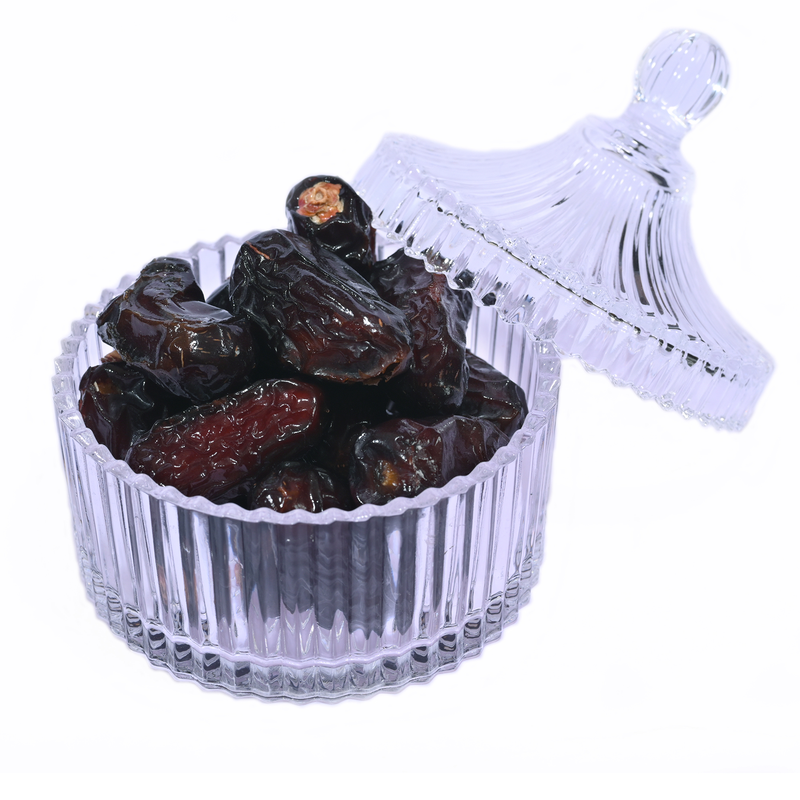 Safawi dates are a soft, semi-dried date variety characteristically identified by their particular deep black color, their length, and medium-size.